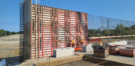 Concrete wall forms being setup at a distrubtion warehouse construction project